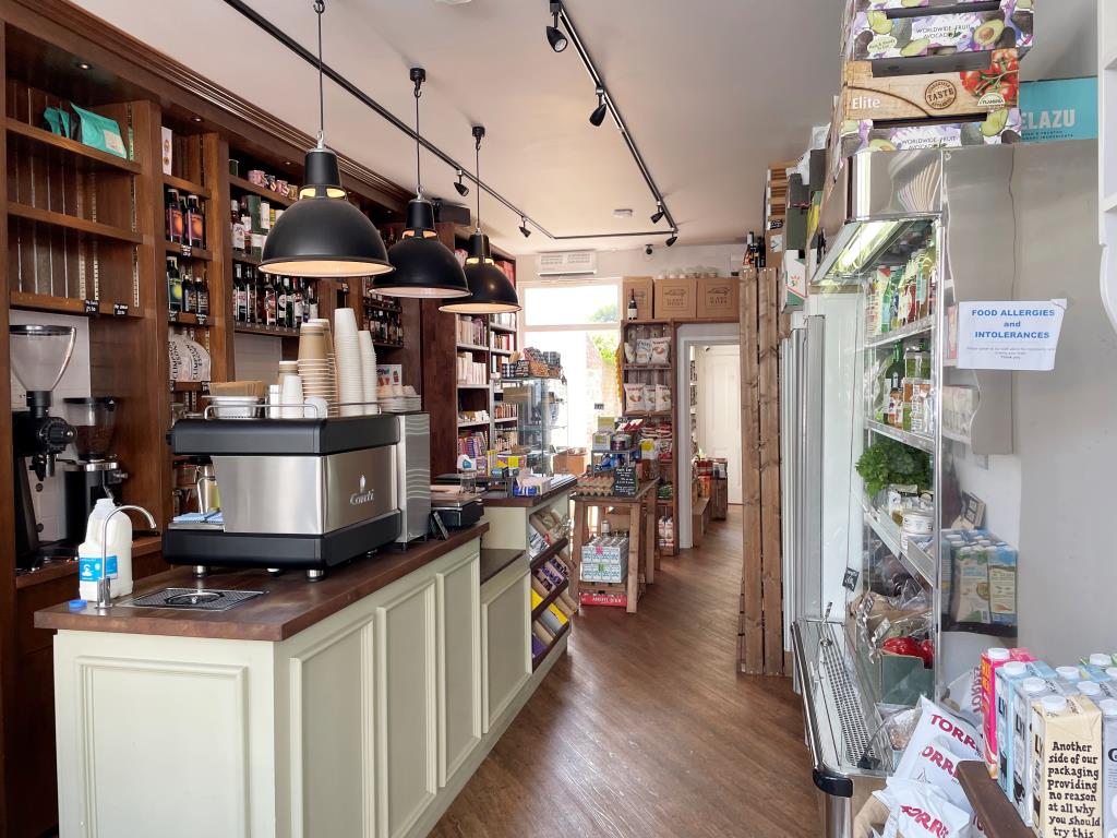 Lot: 23 - MIXED USE PART POSSESSION FOR INVESTMENT - internal front of shop with retail area